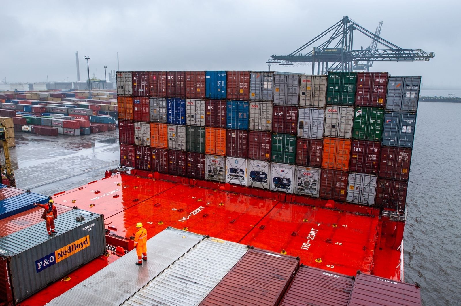 Container ship being loaded at a port terminal